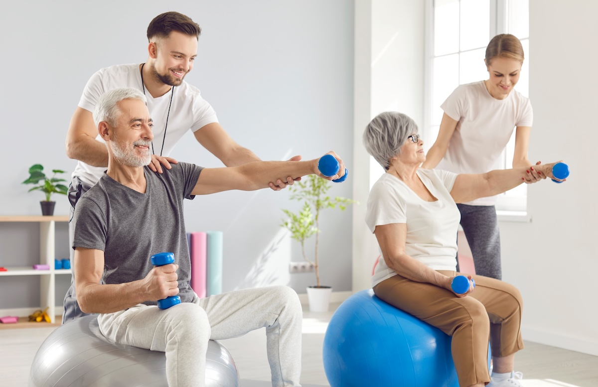 A chiropractor performing a spinal adjustment on a patient in Vancouver, focusing on upper back and shoulder alignment